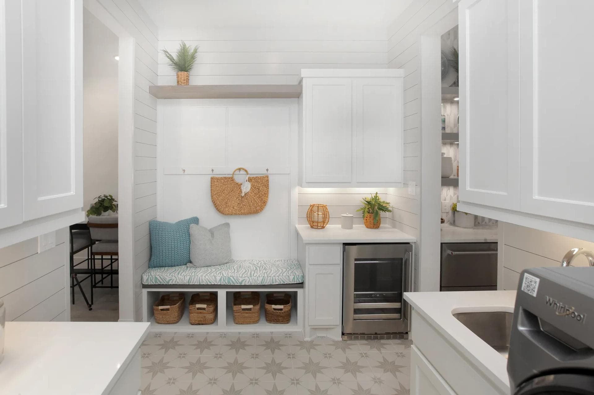 Family-ready room off the 3-car garage with a built-in bench