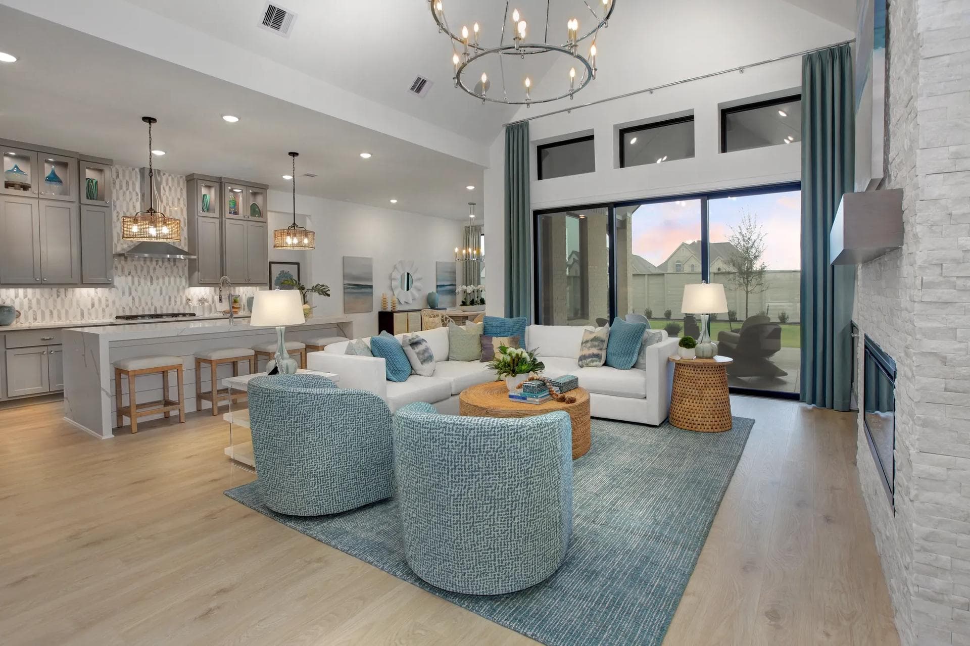 Vaulted family room opening to the kitchen and covered porch
